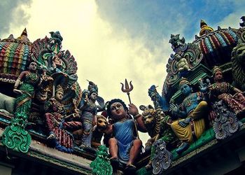 Mariamman (sitting in the middle)