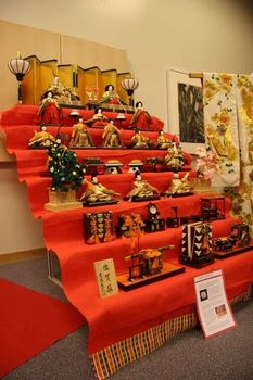 platform with ornamental dolls