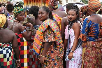 Ghanaian women wearing kente cloth